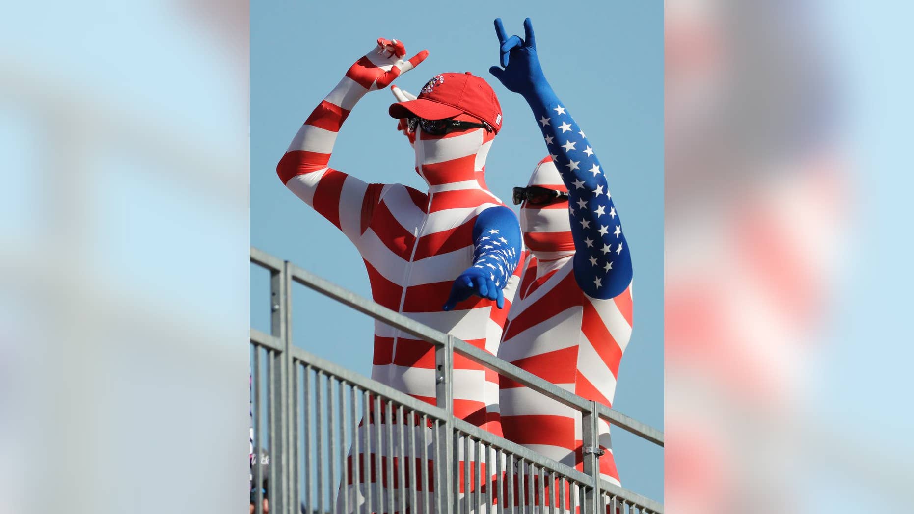 Fans cheer during a four-ball match at the Ryder Cup golf tournament Saturday, Oct. 1, 2016, at Hazeltine National Golf Club in Chaska, Minn. (AP Photo/Charlie Riedel)