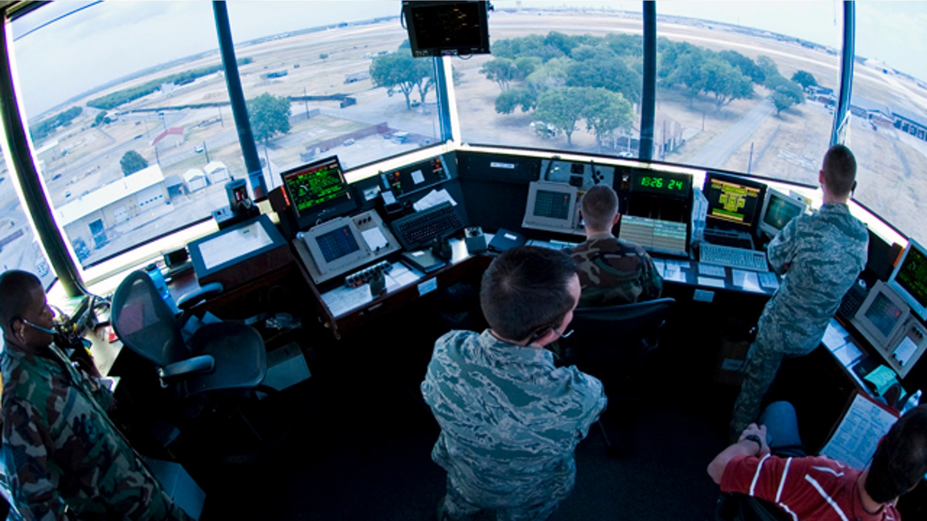 FILE: Air traffic controllers from the 37th Operations Support Squadron prepare to navigate F-16 Falcons down the runway on Lackland Air Force Base.