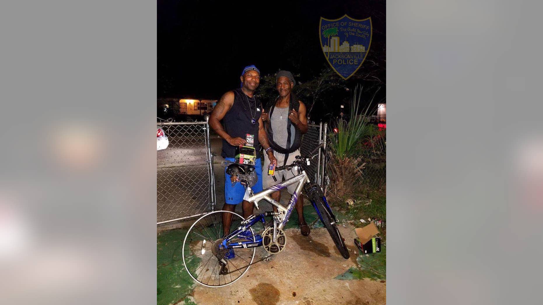 Jacksonville police officer Terrance Hightower bought two new bike tires for the man after seeing him ride down the street with only one functioning wheel. (Jacksonville Sheriff's Office)