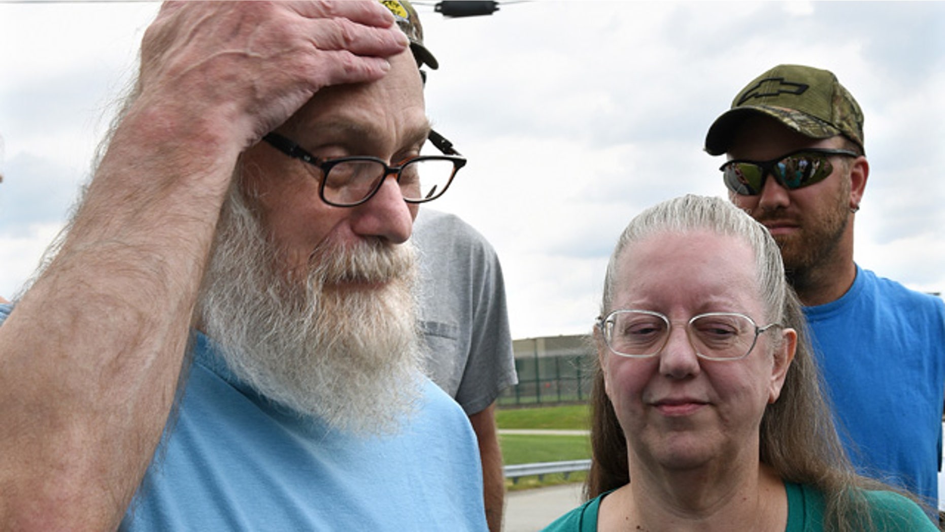 Aug. 13, 2015: Lewis Fogle, pictured with his wife, Deb, becomes emotional after his release from the State Correctional Institution in Pine Grove, Pa. Fogle, who spent 34 years imprisoned for the 1976 murder of a 15-year-old girl, was released after DNA tests proved his was not the person who committed the crime. (Bob Donaldson/Pittsburgh Post-Gazette via AP)