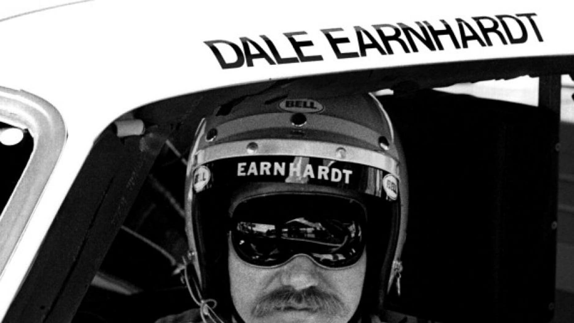 DAYTONA BEACH, FL - FEBRUARY 17, 1980: NASCAR driver Dale Earnhardt Sr. sits in his car at the Daytona International Speedway prior to the start of the 1980 Daytona 500 on February 17, 1980 in Daytona Beach, Florida. (Photo by Robert Alexander/Archive Photos/Getty Images)