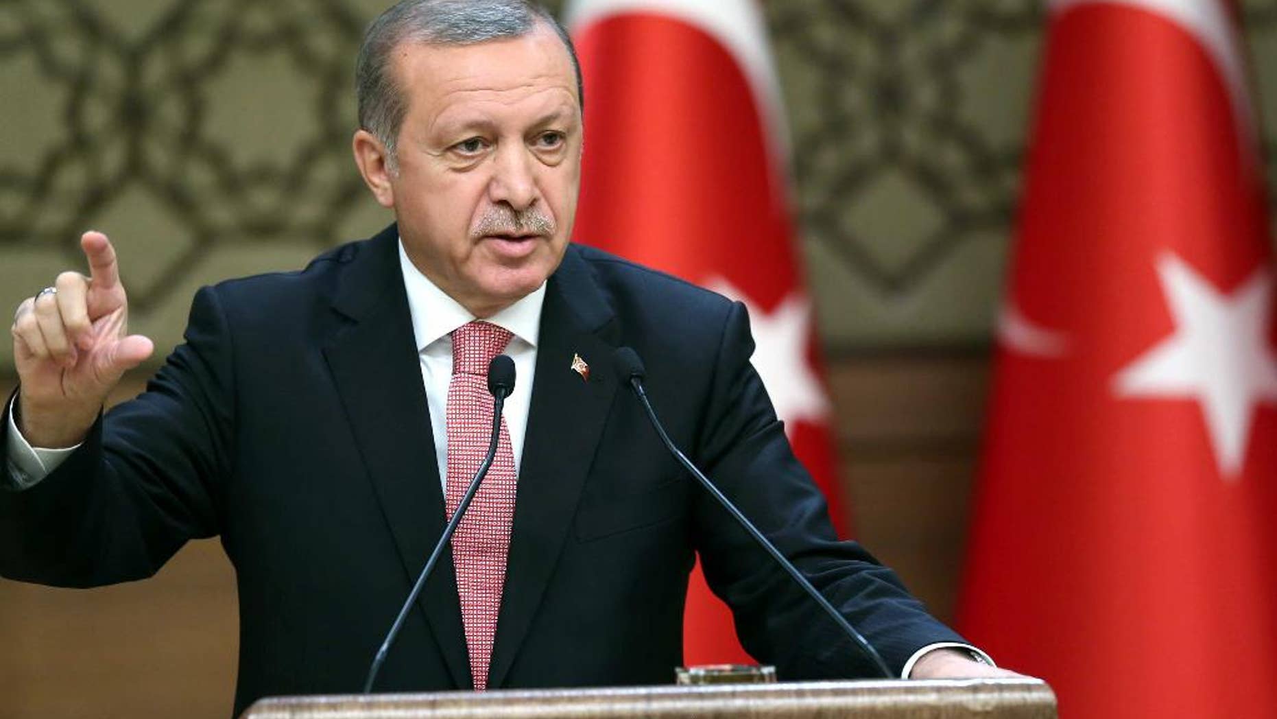 Turkey's President Recep Tayyip Erdogan speaks during an event for foreign investors, in Ankara, Turkey, on Tuesday, Aug. 2, 2016. Erdogan said, once more blasted unnamed Western countries which he says supported an attempted coup on July 15 which left more than 270 people dead. "The West is supporting terrorism and taking sides with coups." (Kayhan Ozer/Presidential Press Service, Pool Photo via AP)