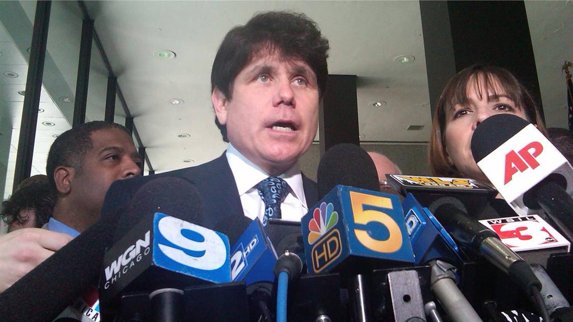 Aug. 12, 2010: Rod Blagojevich speaks to the media during a break at his trial. He was later found guilty on one of 24 counts. The jury deadlocked on the rest.