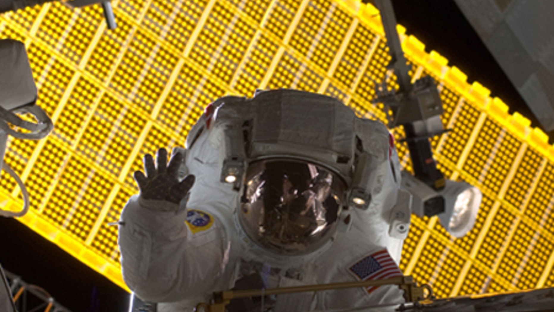 S128-E-007035 (1 Sept. 2009) --- Astronaut Nicole Stott, Expedition 20 flight engineer, participates in the STS-128 mission's first session of extravehicular activity (EVA) as construction and maintenance continue on the International Space Station. During the six-hour, 35-minute spacewalk, Stott and astronaut John "Danny" Olivas (out of frame), mission specialist, removed an empty ammonia tank from the station's truss and temporarily stowed it on the station's robotic arm. Olivas and Stott also retrieved the European Technology Exposure Facility (EuTEF) and Materials International Space Station Experiment (MISSE) from the Columbus laboratory module and installed them on Discovery's payload bay for return.
