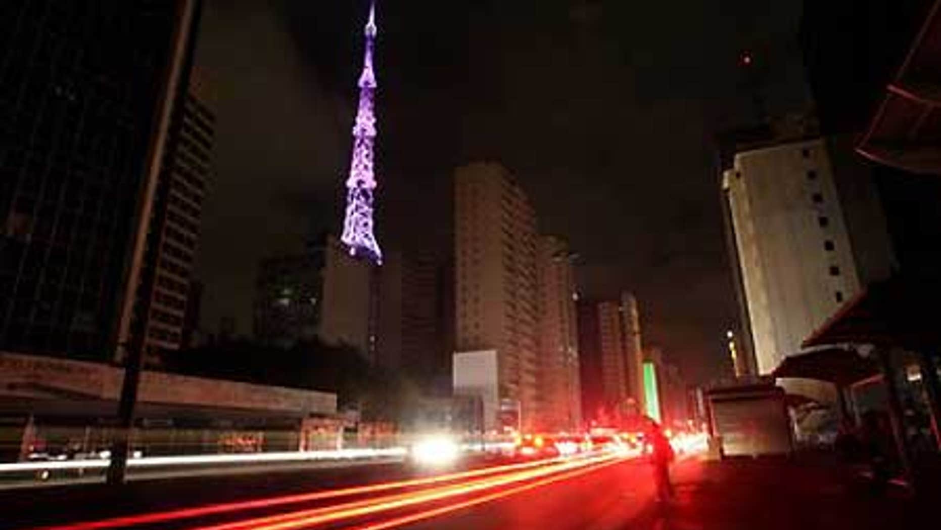 Nov. 10: Cars drive down Paulista Avenue in Sao Paulo, Brazil during a blackout.