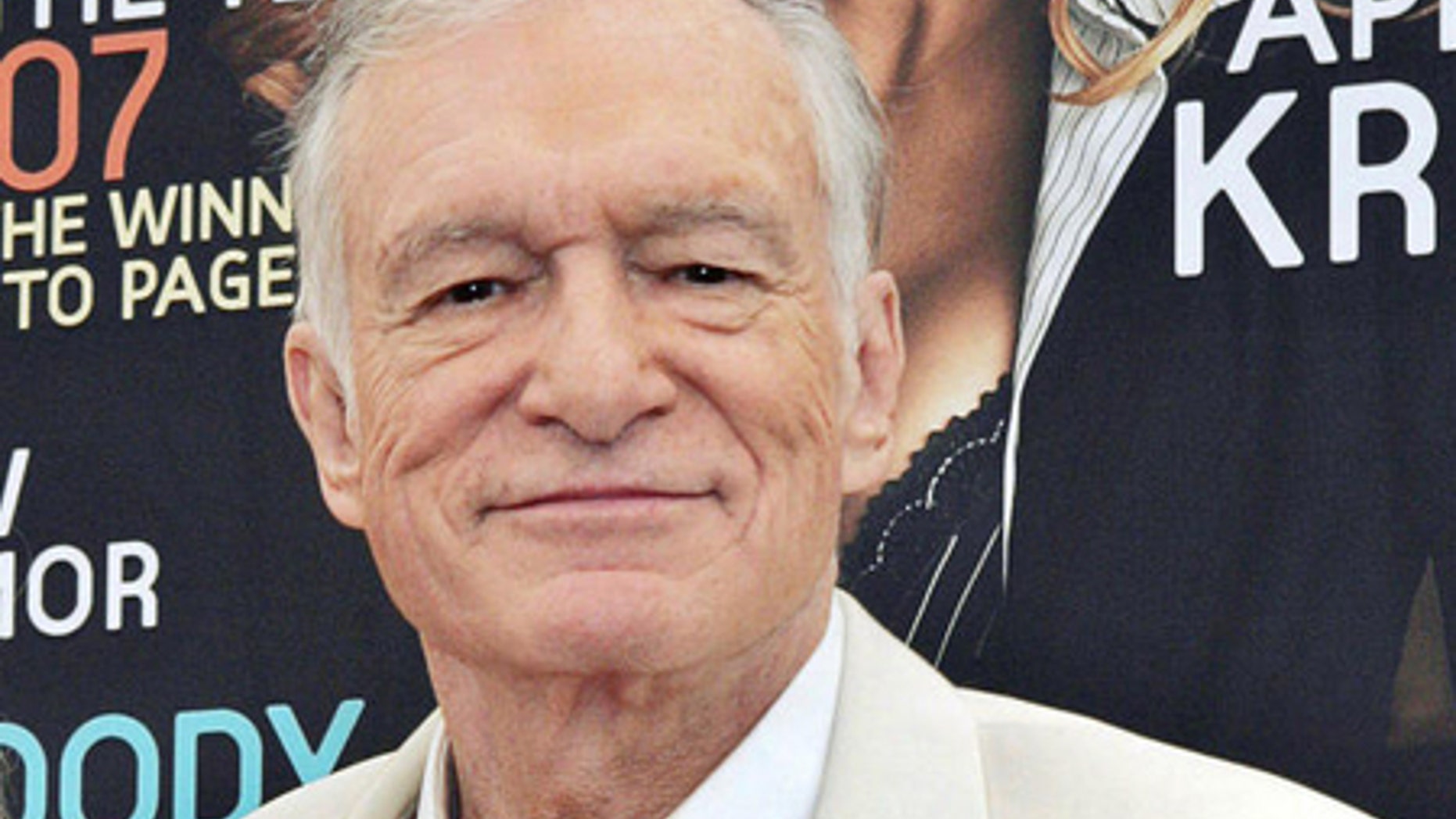 Playboy impresario Hugh Hefner poses with Sara Jean Underwood, Playboy's Playmate of the Year for 2007, at the Playboy Mansion in Los Angeles Thursday, May 3, 2007. (AP Photo/Reed Saxon)