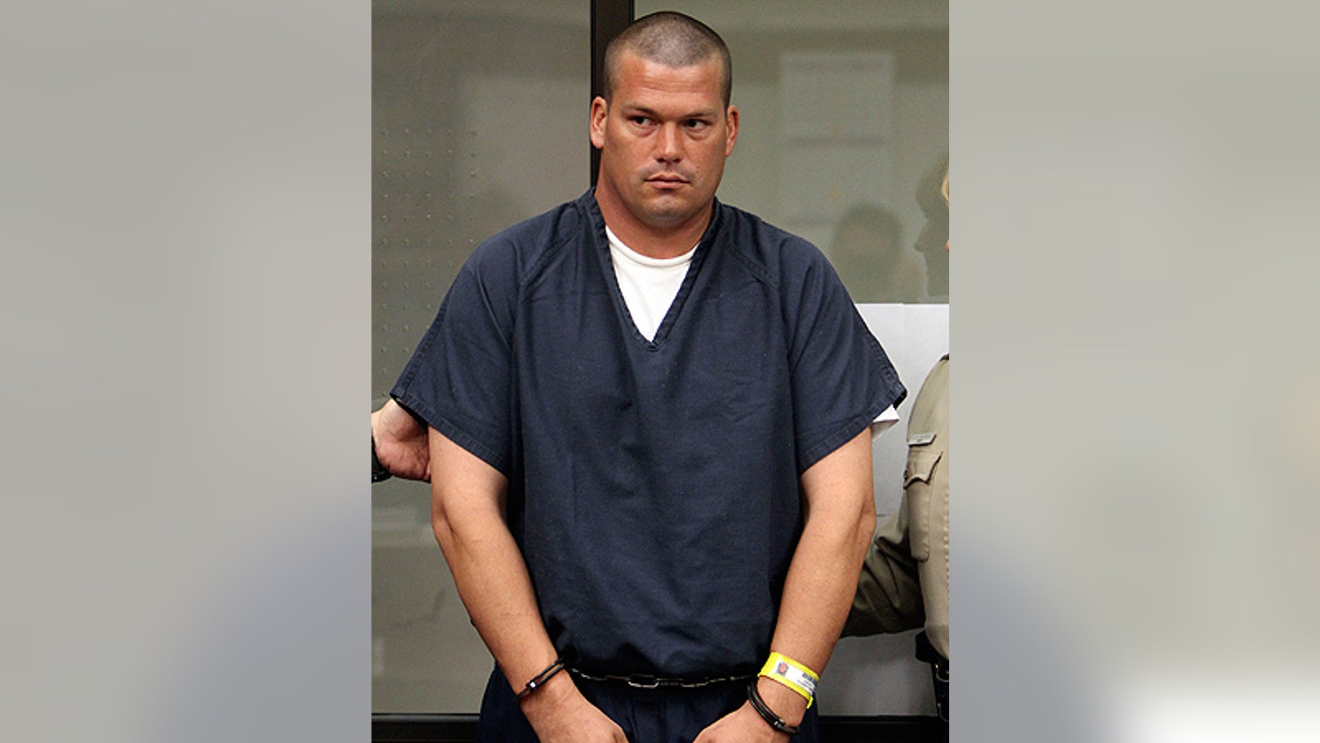 Mar. 3: John Albert Gardner III is escorted by sheriff deputies as he glances toward the judge at an arraignment in San Diego.