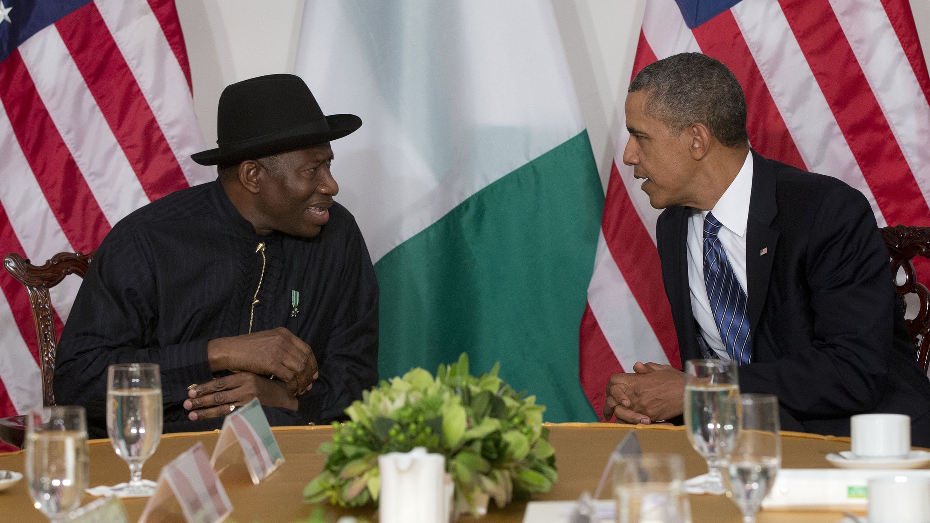 FILE - President Barack Obama meets with Nigerian President Goodluck Jonathan in New York, in this Monday, Sept. 23, 2013 file photo. The Associated Press on Monday Jan. 13 2014 obtained a copy of the previously unannounced Same Sex Marriage Prohibition Act that was signed by President Jonathan and dated Jan. 7 that bans same-sex marriage and criminalizes homosexual associations, societies and meetings, with penalties of up to 14 years in jail. Secretary of State John Kerry said Monday the United States was "deeply concerned" by a law that "dangerously restricts freedom of assembly, association, and expression for all Nigerians." (AP Photo/Pablo Martinez Monsivais, File)