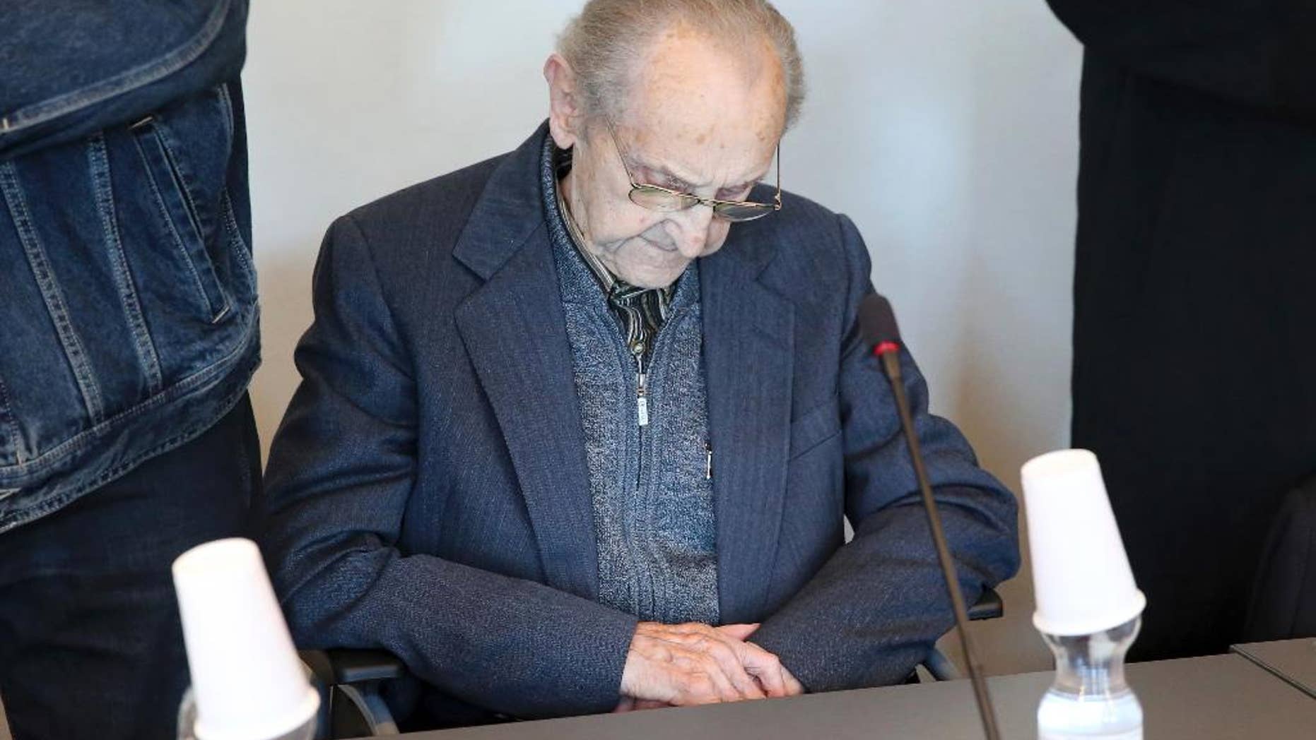 FILE - In this Sept. 12, 2016 file photo Hubert Zafke sits in a courtroom ahead of his trial in Neubrandenburg, eastern Germany. The former SS medic who served at the Auschwitz death camp is on trial in the northern German city of Neubrandenburg. (Bernd Wuestneck/dpa via AP)