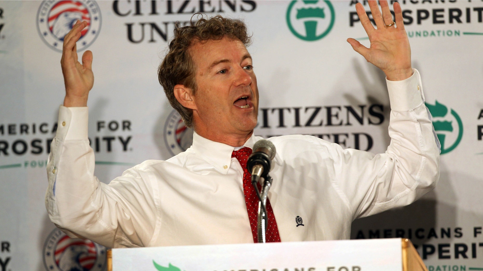 Sen. Rand Paul, R-Ky. speaks at a GOP Freedom Summit, Saturday, April 12, 2014, in Manchester, N.H. Several potential Republican White House contenders _ among them Kentucky Sen. Rand Paul, Sen. Ted Cruz, and former Arkansas Gov. Mike Huckabee _ headline a conference Saturday in New Hampshire, hosted by the conservative groups Citizens United and Americans for Prosperity. (AP Photo/Jim Cole)