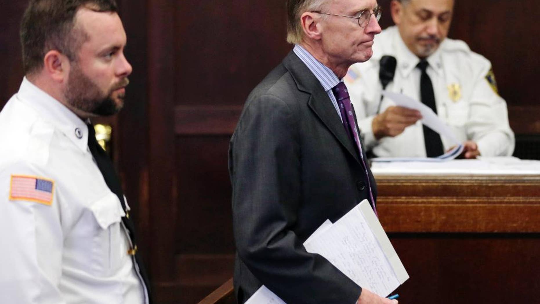FILE - Charles Rankin, lawyer for former New England Patriots football player Aaron Hernandez, stands before Judge Jeffrey Locke during a hearing at Suffolk Superior Court in Boston, in this Oct. 21, 2014 file photo. The lawyers for former New England Patriots player Aaron Hernandez are set to go before a judge Thursday Oct. 30, 2014 to argue that his trial in the 2013 killing of a semiprofessional football player should be moved because of intense pretrial media coverage. (AP Photo/Charles Krupa, Pool, File)