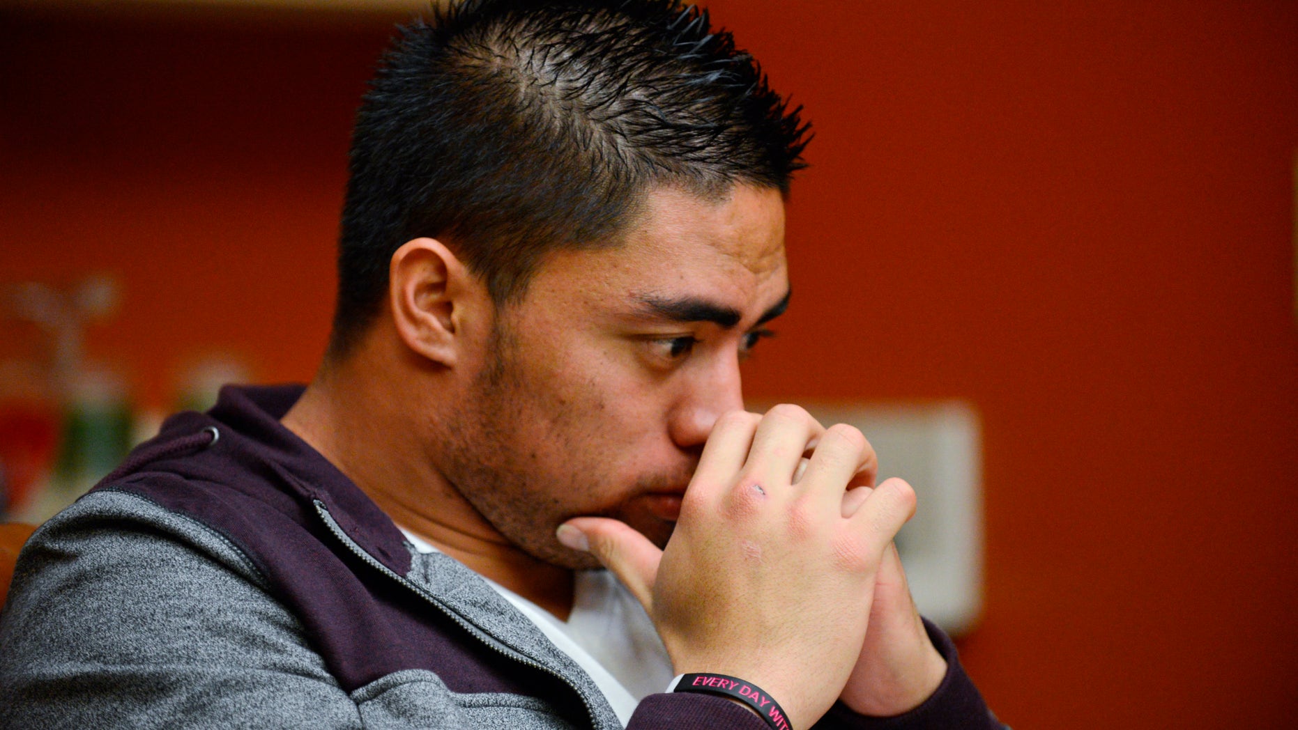In a photo provided by ESPN, Notre Dame linebacker Manti Te'o pauses during an interview with ESPN on Friday, Jan. 18, 2013, in Bradenton, Fla. ESPN says Te'o maintains he was never involved in creating the dead girlfriend hoax. He said in the off-camera interview: "When they hear the facts they'll know. They'll know there is no way I could be a part of this." (AP Photo/ESPN Images, Ryan Jones) MANDATORY CREDIT