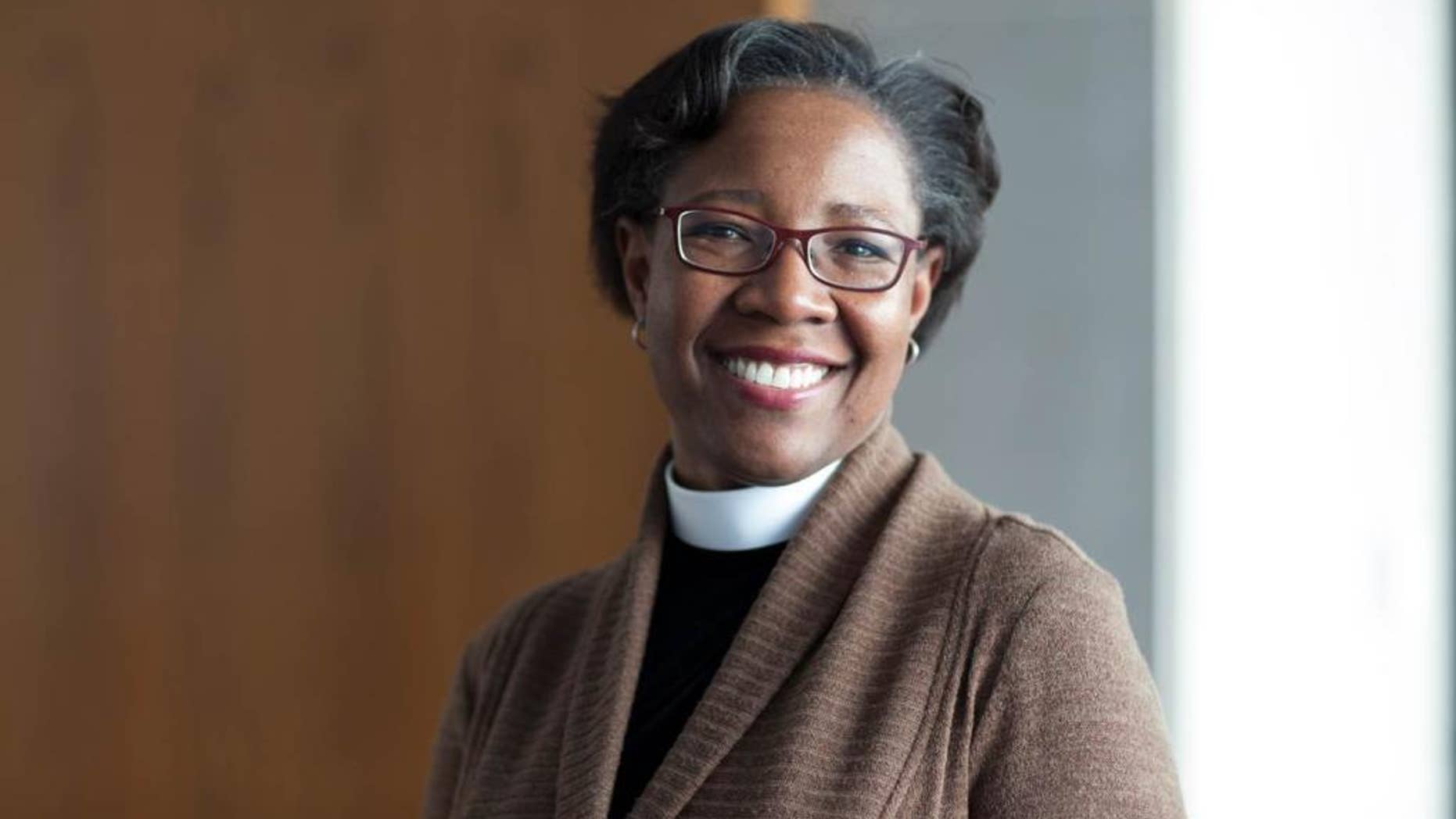 This undated photo provided by Charlie Simokaitis shows the Rev. Jennifer Baskerville-Burrows. The Episcopal Church has elected the first black woman to lead one of its dioceses. The Rev. Jennifer Baskerville-Burrows was elected Friday, Oct. 28, 2016 to head the Diocese of Indianapolis. (Charlie Simokaitis via AP)