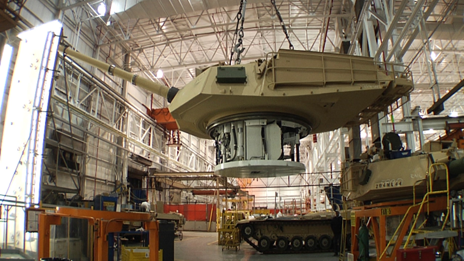 FILE - This undated file photo provided by the General Dynamics Land System shows the production of an Abrams tank in Lima, Ohio. The U.S. decision to suspend delivery of tanks, helicopters and fighter jets to Egypt is more of a symbolic slap than a punishing wound to the military-backed government for its slow slog toward a return to democratic rule. (AP Photo/General Dynamics Land System, File)