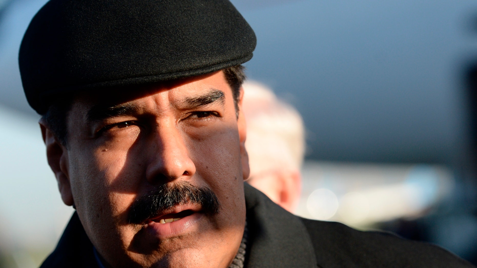 FILE - In this Friday, May 8, 2015, file photo, Venezuela's President Nicolas Maduro is on his arrival at Vnukovo airport in Moscow. Whether its from corruption scandal or stagnant growth, the prospects for the crop of leftist Latin American presidents that have been running the region since the start of the millennium appear to be dimming. No leader has been harder hit than Venezuelan President Nicolas Maduro, who's approval ratings have tumbled amid the crisis to 28 percent, near the lowest in 16 years of socialist rule, and while theres no sign the sometimes violent street protests that overwhelmed the country a year ago will return anytime soon, polls indicate that the opposition will coast to victory in legislative elections expected to take place by year end. (RIA Novosti Pool Photo via AP, File)