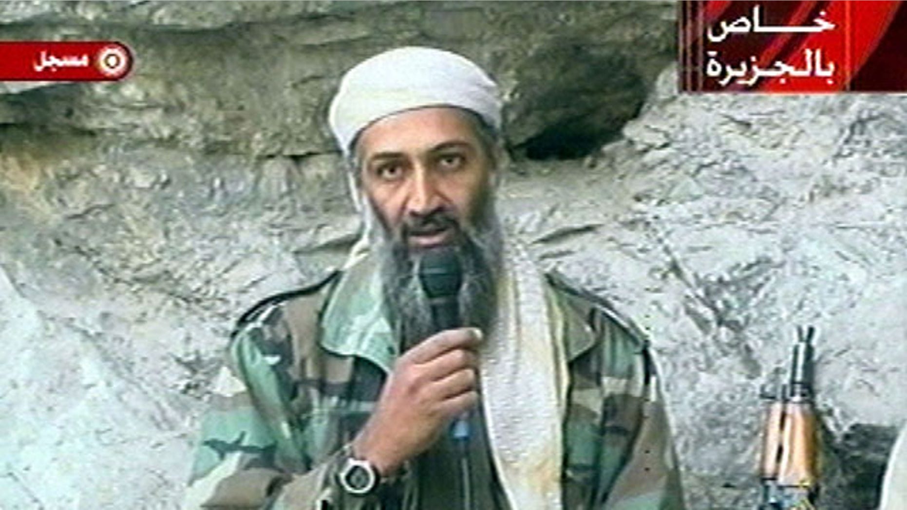 Oct. 7: This image, made from a video broadcast, shows Usama bin Laden at an undisclosed location. The Al Qaeda leader threatened to kill French citizens in a new audio tape posted Oct. 27 to avenge their country's support for the U.S.-led war in Afghanistan.