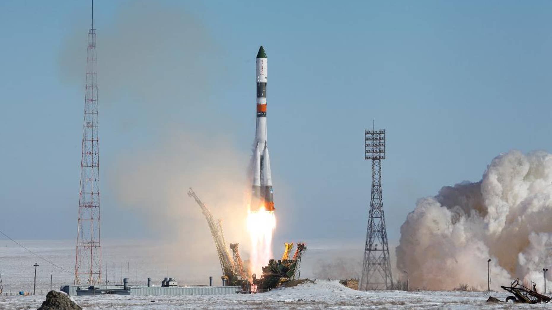 In this photo provided by the Russian Space Agency (Roscosmos) press service, a Soyuz-U booster rocket carrying the Progress MS-05 spacecraft blasts off from the Russian-leased Baikonur Cosmodrome in Kazakhstan Wednesday, Feb. 22, 2017. The unmanned Russian cargo ship lifted off successfully Wednesday on a supply mission to the International Space Station. (Russian Space Agency Roscosmos press service via AP)