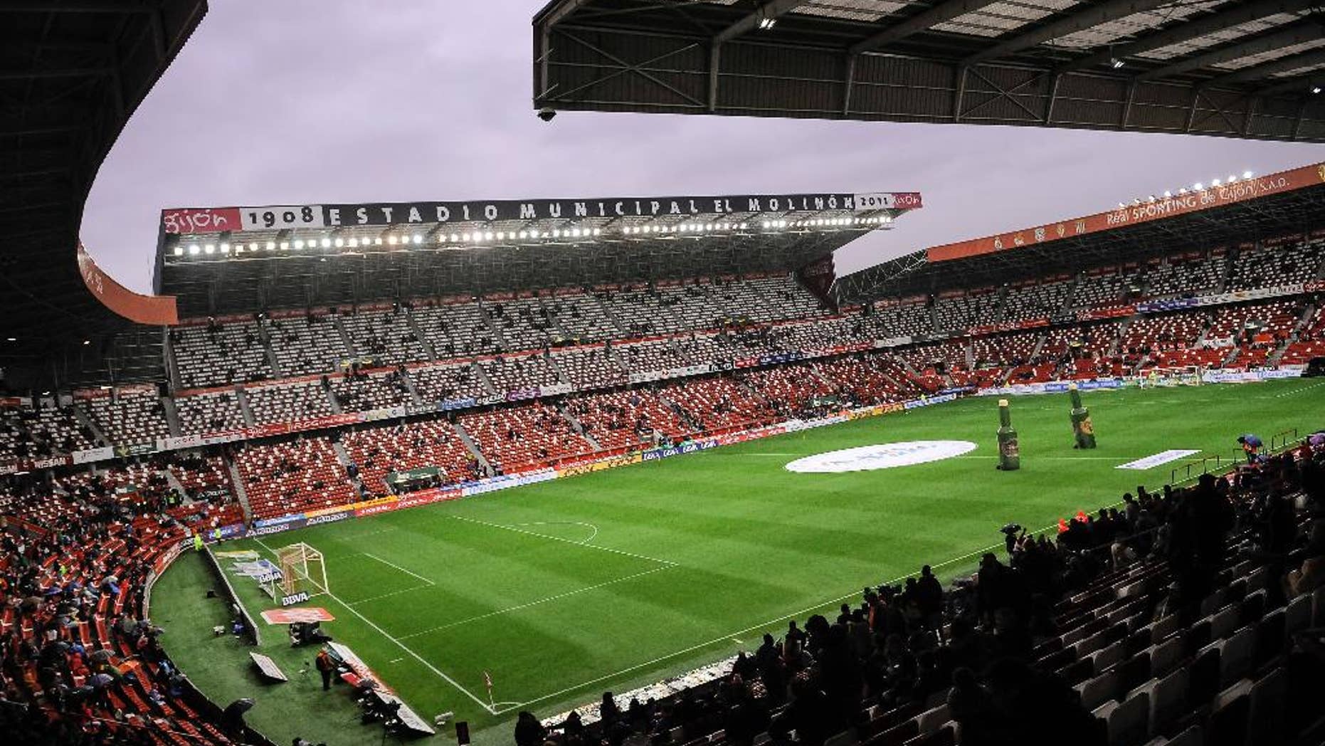 FILE- In this Wednesday, Feb. 17, 2016 file photo, a general view of the El Molinon stadium during their Spanish La Liga soccer match between Sporting de Gijon and FC Barcelona, in Gijon, northern Spain. Sporting Gijon said Thursday, Nov. 17, 2016, it has been ordered to close part of its stadium during one game in the Spanish league because its fans allegedly racially insulted a player from an opposing team. (AP Photo/Alvaro Barrientos, File)