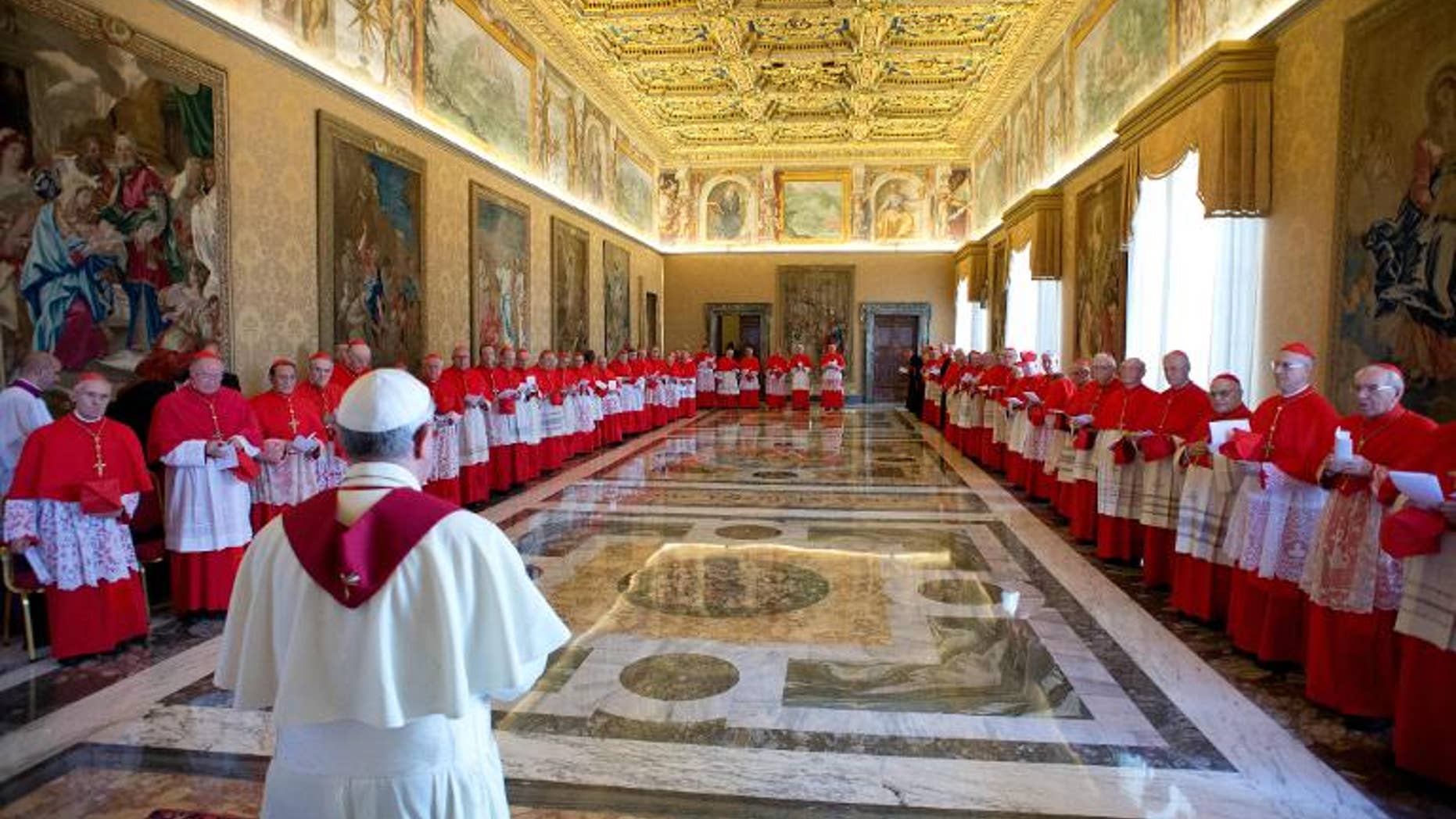 Pope Francis meets a consistory of cardinals on September 30, 2013 at the Vatican. In an interview, Pope Francis has condemned "leprosy" in the Vatican and said the papacy was "too Vatican-centric"