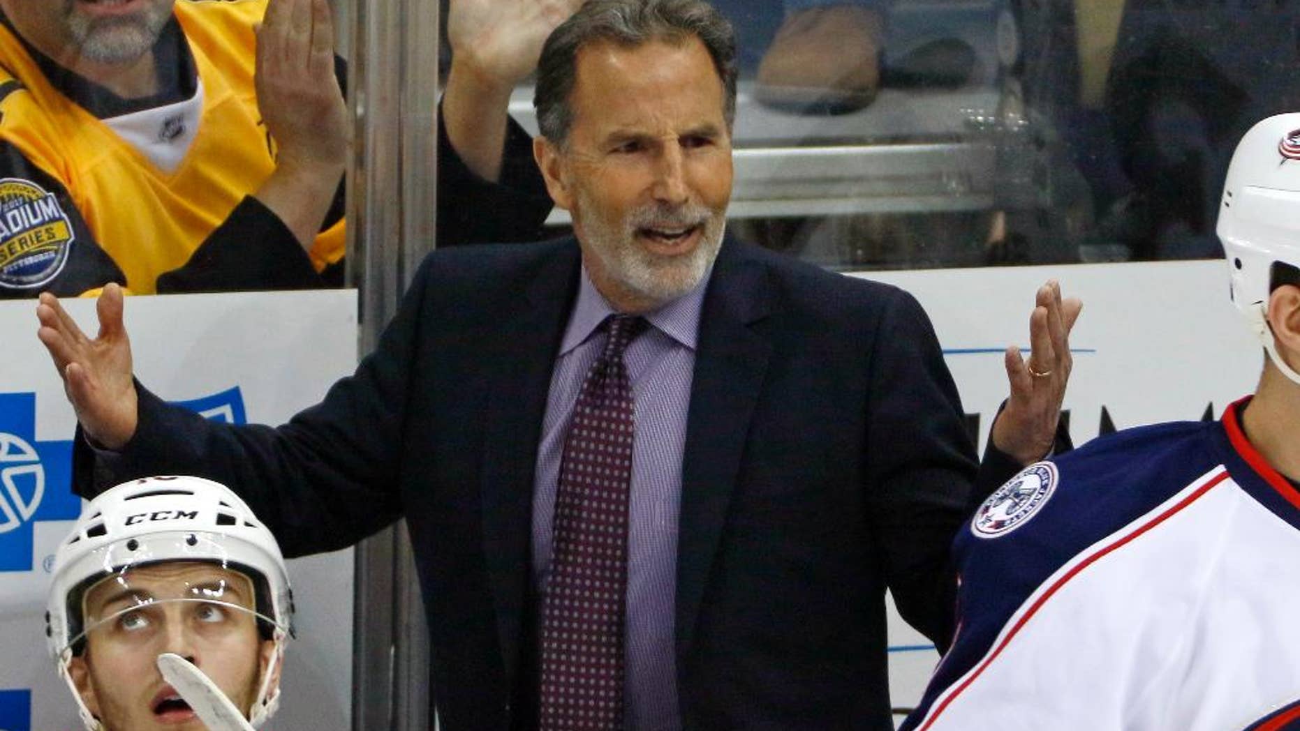 File- This April 12, 2017, file photo shows Columbus Blue Jackets head coach John Tortorella questioning an official during the first period in Game 1 of an NHL first-round hockey playoff series in Pittsburgh. Tortorella sent Columbus Blue Jackets players a terse personal letter letting them know that uncomfortable times were ahead. But if they worked hard, he wrote, it would all be worth it. (AP Photo/Gene J. Puskar, File)
