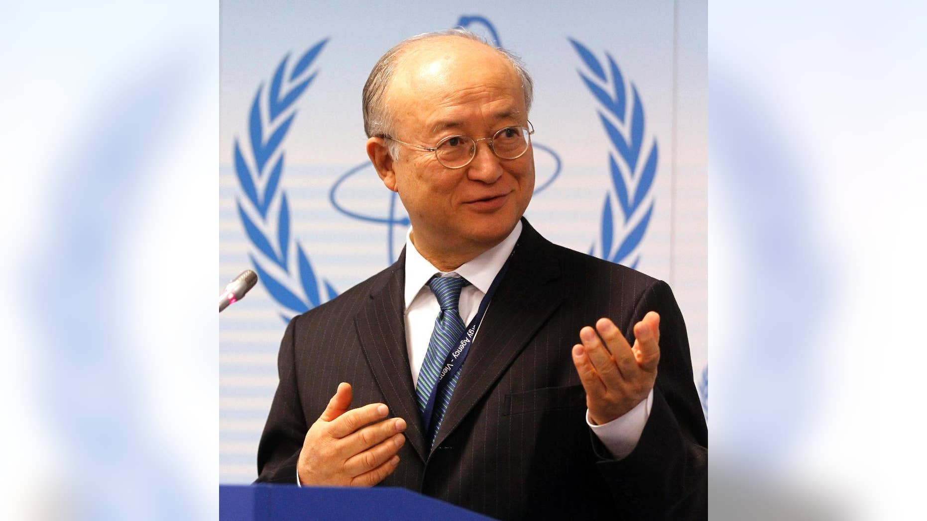 File-This April 4, 2011, file photo shows Director General of the International Atomic Energy Agency, IAEA, Yukiya Amano from Japan speaking during a news conference of the IAEA's Parties to Nuclear Safety Convention Hold Review at the International Center in Vienna, Austria. The head of the U.N. nuclear agency is heading to Tehran for high-level meetings as he tries to accelerate his probe of allegations that Iran worked in the past on nuclear weapons. Fredrik Dahl of the U.N's International Atomic Energy Agency said that Amano's meetings Sunday, Sunday, Sept. 20, 2015, are aimed at "clarifications of past and present outstanding issues" linked to the agency's probe. (AP Photo/Ronald Zak, File)