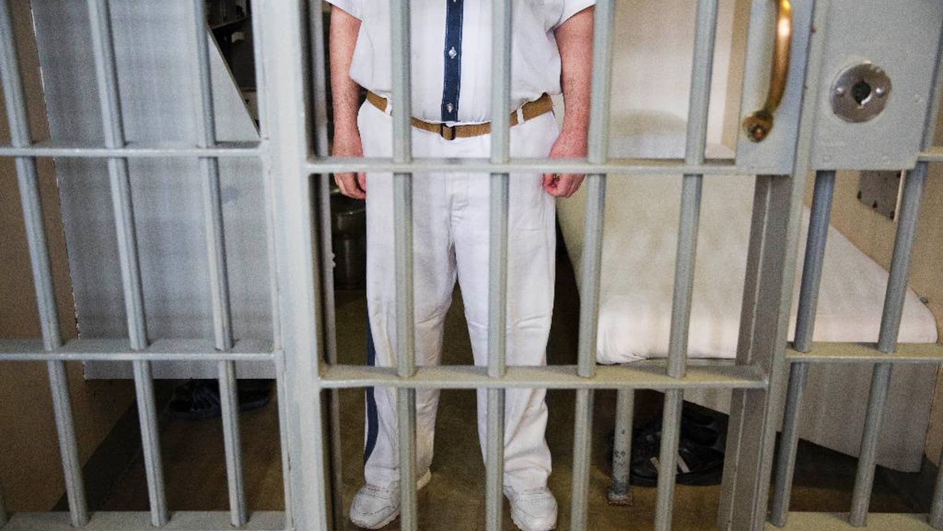 A prisoner stands at his cell at the Georgia Diagnostic and Classification Prison.