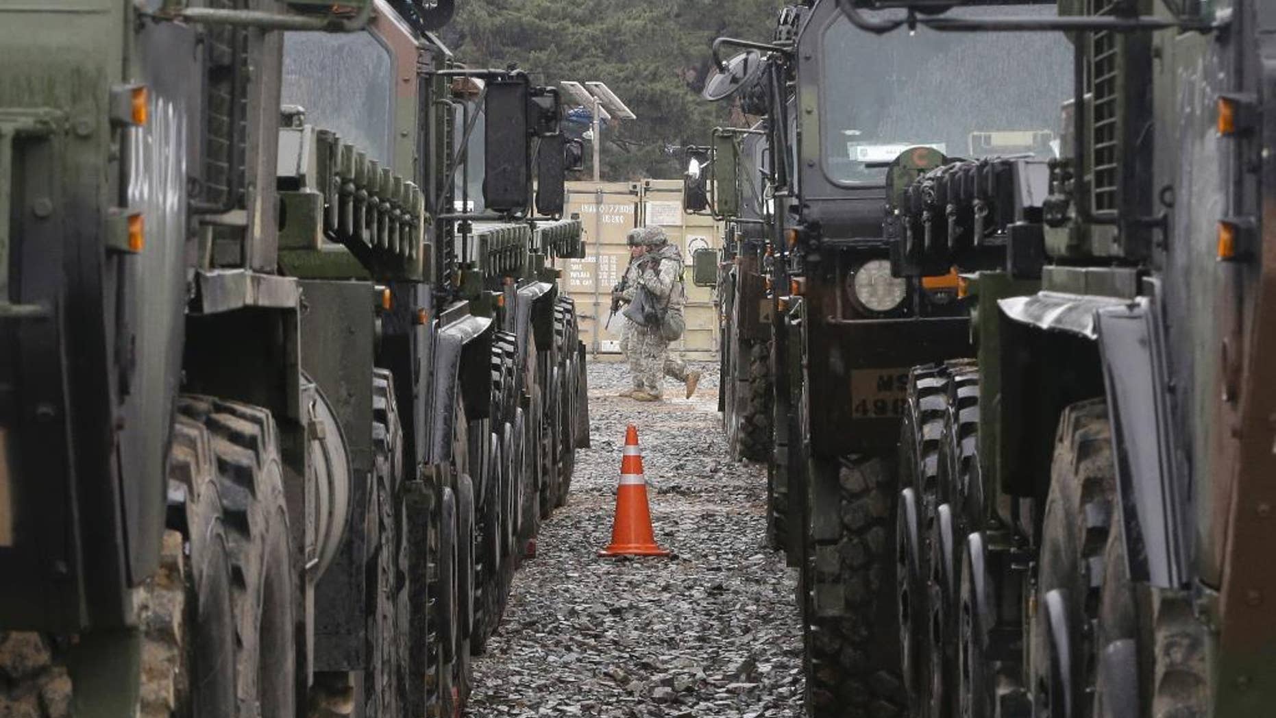 FILE - In this April 11, 2017 file photo, U.S. Marine soldiers patrol during the U.S.-South Korea joint Exercise Operation Pacific Reach in Pohang, South Korea. The Trump administration has settled on its North Korea strategy after a two-month review: “Maximum pressure and engagement.” (AP Photo/Ahn Young-joon, File)