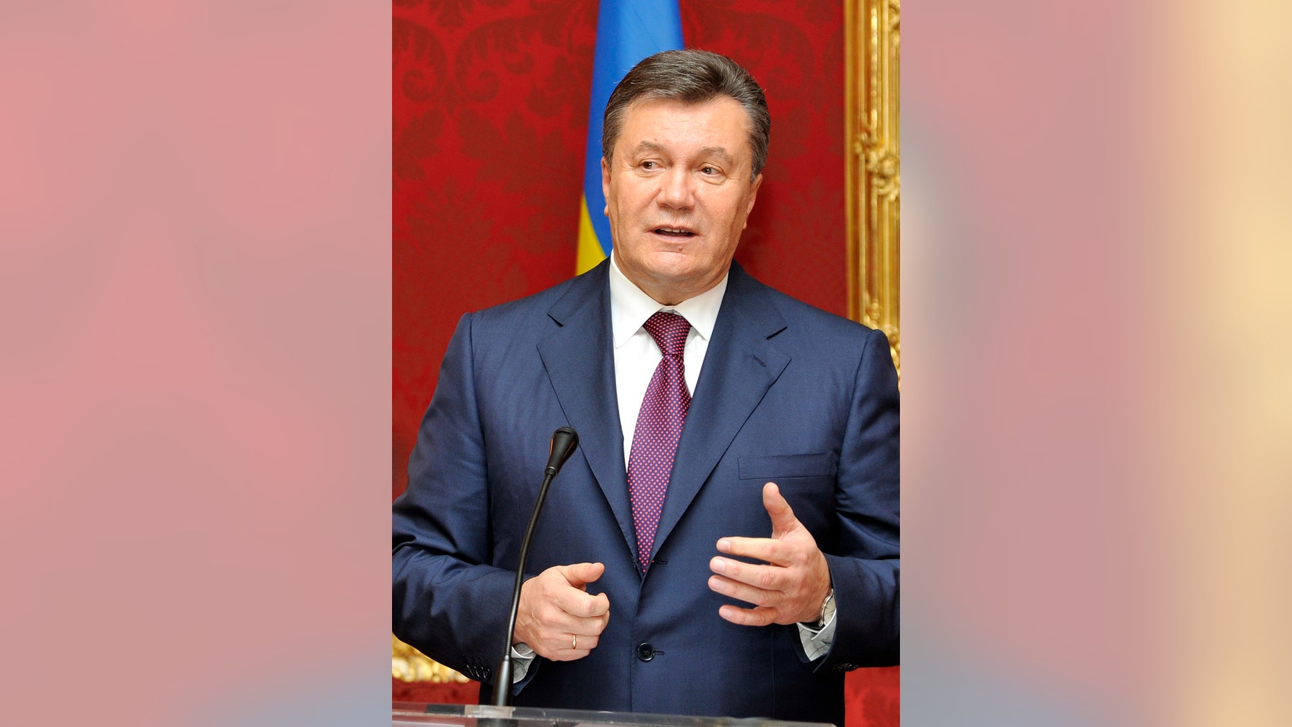 FILE - In this Thursday, Nov. 21, 2013 file photo, Ukrainian President Viktor Yanukovych speaks during a news conference after his meeting with Austrian President at the Hofburg palace, in Vienna, Austria. Yanukovych suffered a humiliation in 2004 when his victory in the fraud-tainted presidential election was declared void under the pressure of massive unprecedented protests dubbed the Orange Revolution, allowing his pro-Western rival to win power. But Yanukovych took advantage of the troubled economy and infighting in the Orange camp to win the 2010 presidential vote. (AP Photo/Hans Punz, File)