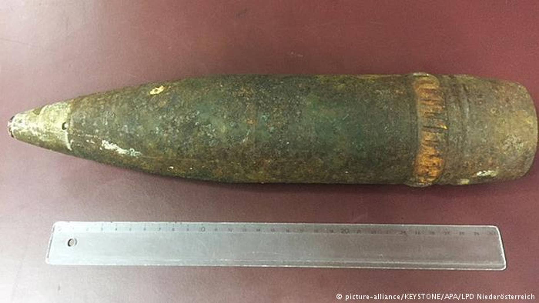 An American tourist was fined nearly $5,000 dollars after she tried to take a World War II artillery shell she found while hiking on her plane in Vienna, Austria.