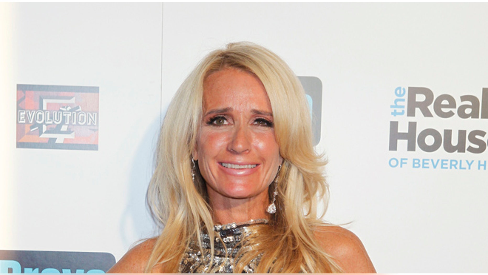 October 11, 2010. Cast member Kim Richards of "The Real Housewives of Beverly Hills" poses on the red carpet at the premiere party in Los Angeles.