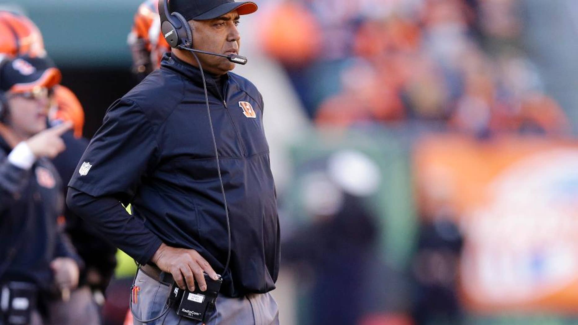 Cincinnati Bengals head coach Marvin Lewis watches front he sidelines during the first half of an NFL football game against the Jacksonville Jaguars in Cincinnati, Sunday, Nov. 2, 2014. (AP Photo/David Kohl)