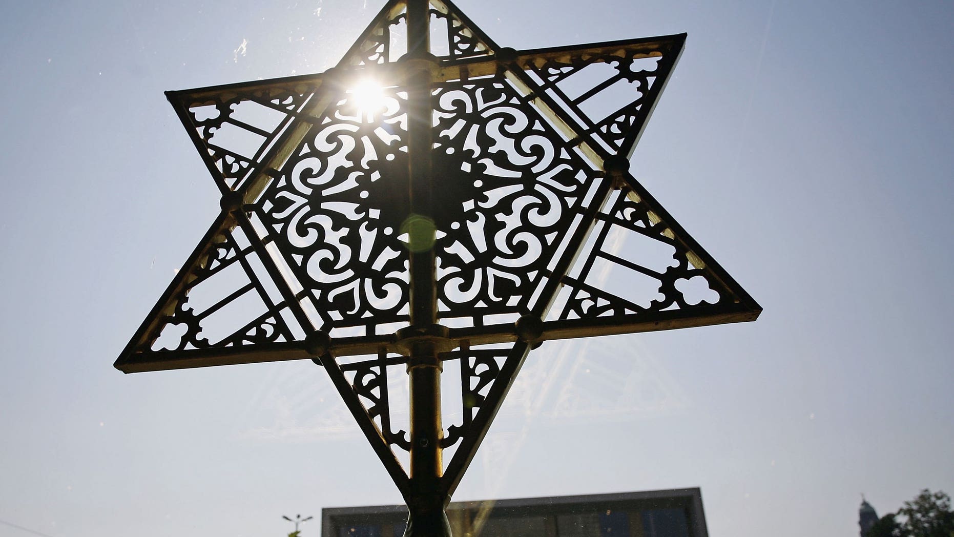 DRESDEN, GERMANY - SEPTEMBER 14: The Star of David is seen over the entrance of the New Synagoge at the ordination of new rabbis on September 14, 2006 in Dresden, Germany. Abraham Geiger College, the first liberal rabbinical seminary founded in Continental Europe since World War II, ordains the first three candidates as rabbis since the "Hochschule fuer die Wissenschaft des Judentums" in Berlin was forcefully closed in 1942. The three newly ordained rabbis will become members of the Central Conference of American Rabbis and will serve communities in Munich, Oldenburg and Cape Town. (Photo by Carsten Koall/Getty Images)