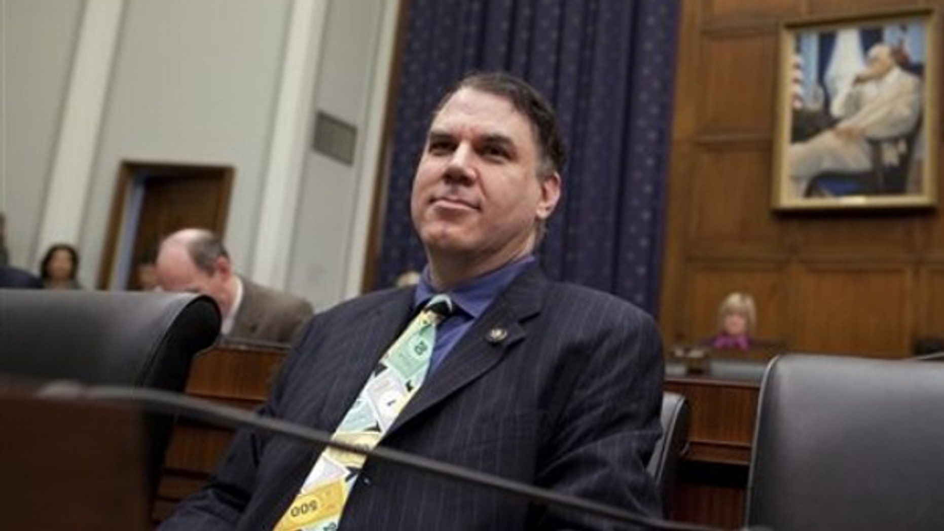 Oct. 1, 2009: Rep. Alan Grayson listens to Federal Reserve Chairman Ben Bernanke testify on Capitol Hill in Washington.