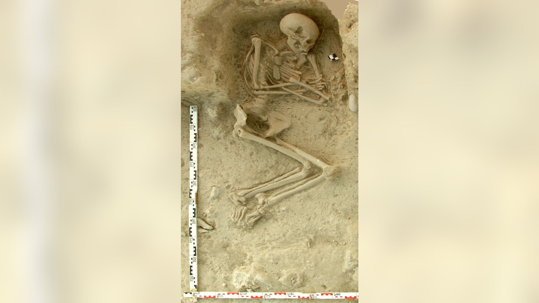 This undated picture provided by the Paliambela Excavation Project Archive, shows a human burial from the archaeological site of Paliambela in northern Greece. Stone Age people from the Aegean region moved into central and southern Europe some 8,000 years ago and introduced agriculture to a continent still dominated at the time by hunter-gatherers, scientists say. The findings were published Monday June 6, 2016 in the Proceedings of the National Academy of Science. (K. Kotsakis, P. Halstead/Paliambela Excavation Project Archive via AP)