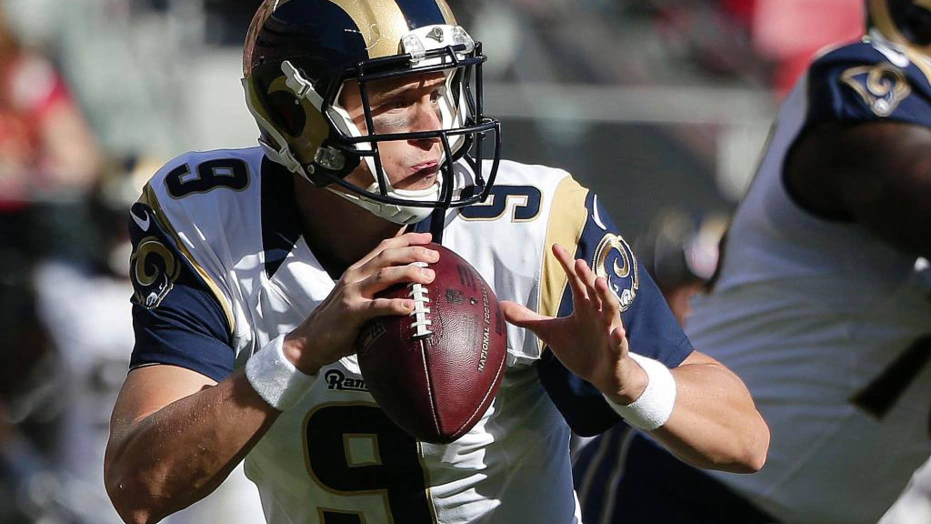 St. Louis Rams quarterback Austin Davis (9) passes against the San Francisco 49ers during the first quarter of an NFL football game in Santa Clara, Calif., Sunday, Nov. 2, 2014. (AP Photo/Marcio Jose Sanchez)