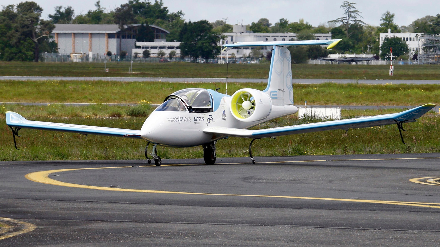File photo: An E-Fan aircraft is seen on the tarmac for its first public flight during the e-Aircraft Day at the Bordeaux Merignac airport, southwestern France, April 25, 2014. The all-electric plane E-Fan, developed by Airbus Group, is 6.7 metres long with a 9.5 metre wingspan, and has two electric turbines with a total power of 60kW. Its has a cruising speed of 160 km/h (99 mph) for about an hour of flight time. (REUTERS/Regis Duvignau)