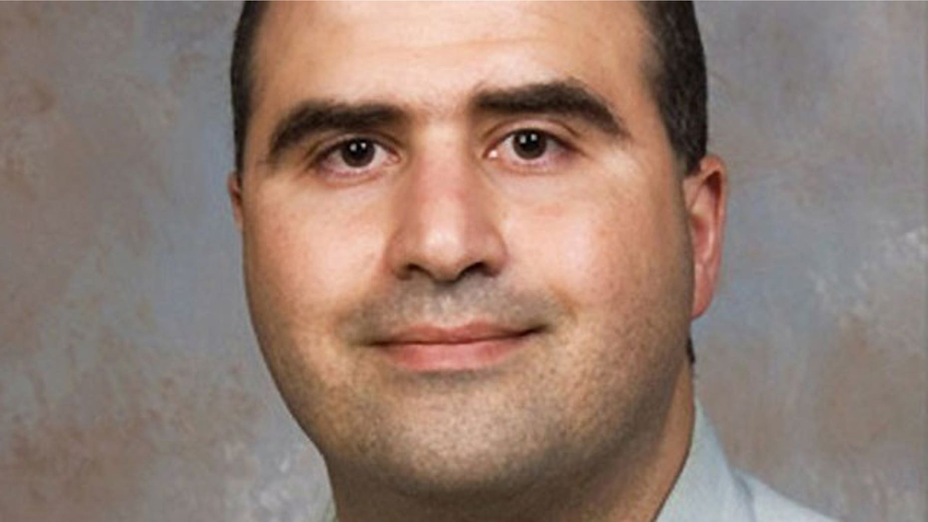 Major Nidal Malik Hasan, the U.S. Army doctor identified by authorities as the suspect in a mass shooting at the U.S. Army post in Fort Hood, Texas, is seen in this undated handout photo. (Reuters)