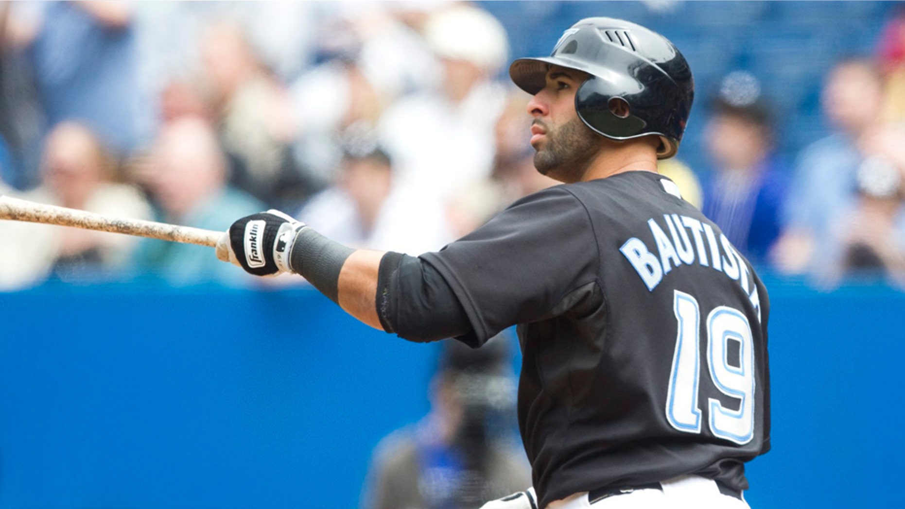 May 28: Toronto Blue Jays Jose Bautista watches his three-run home run hit during the first inning of a baseball game.(AP Photo/The Canadian Press, Darren Calabrese)