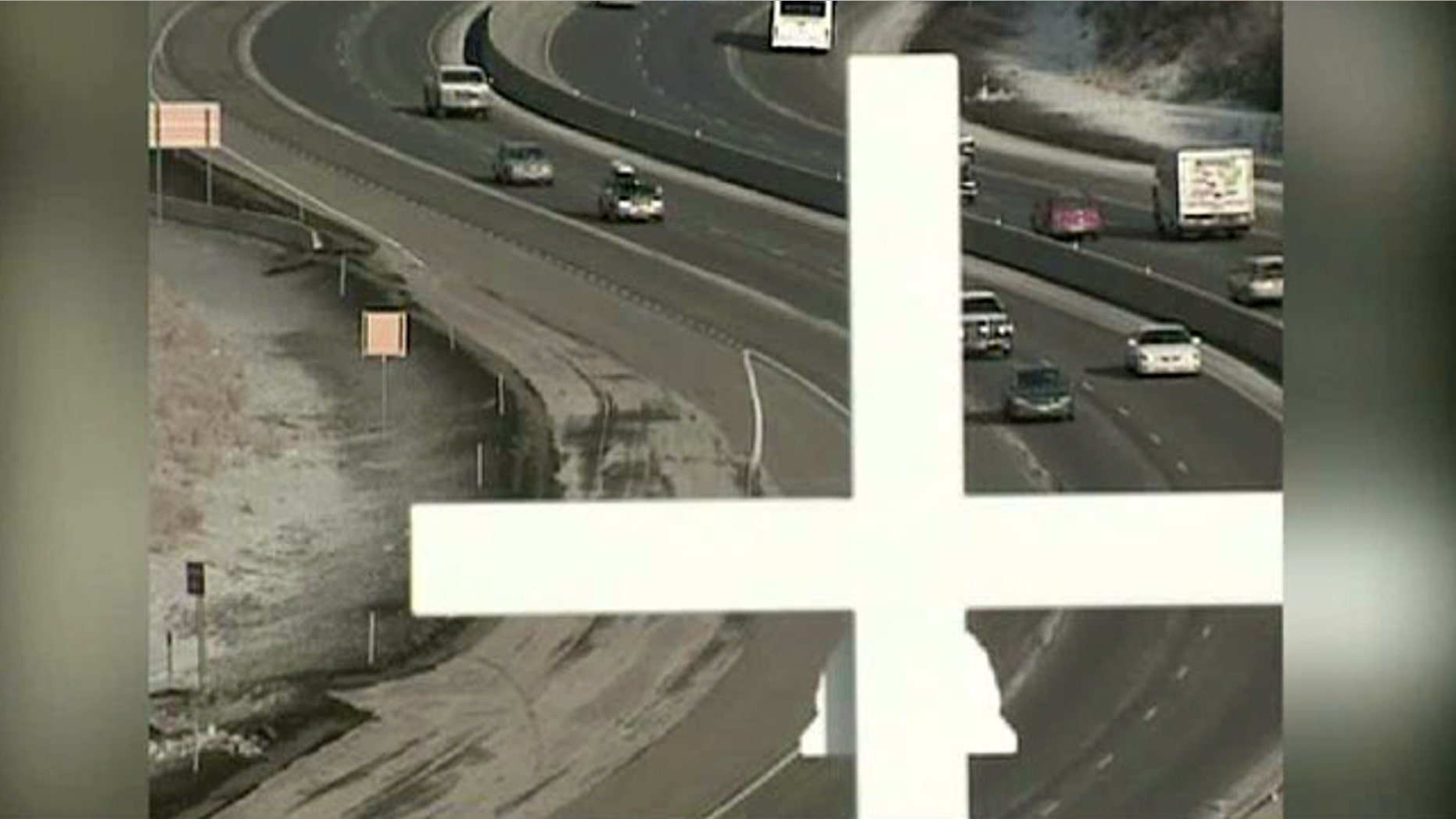 FILE: A three-judge panel from Denver's 10th U.S. Circuit Court of Appeals, in its 38-page ruling against highway memorials, said that a "reasonable observer" would conclude that the state and the Utah Highway Patrol were endorsing Christianity with the cross memorials.