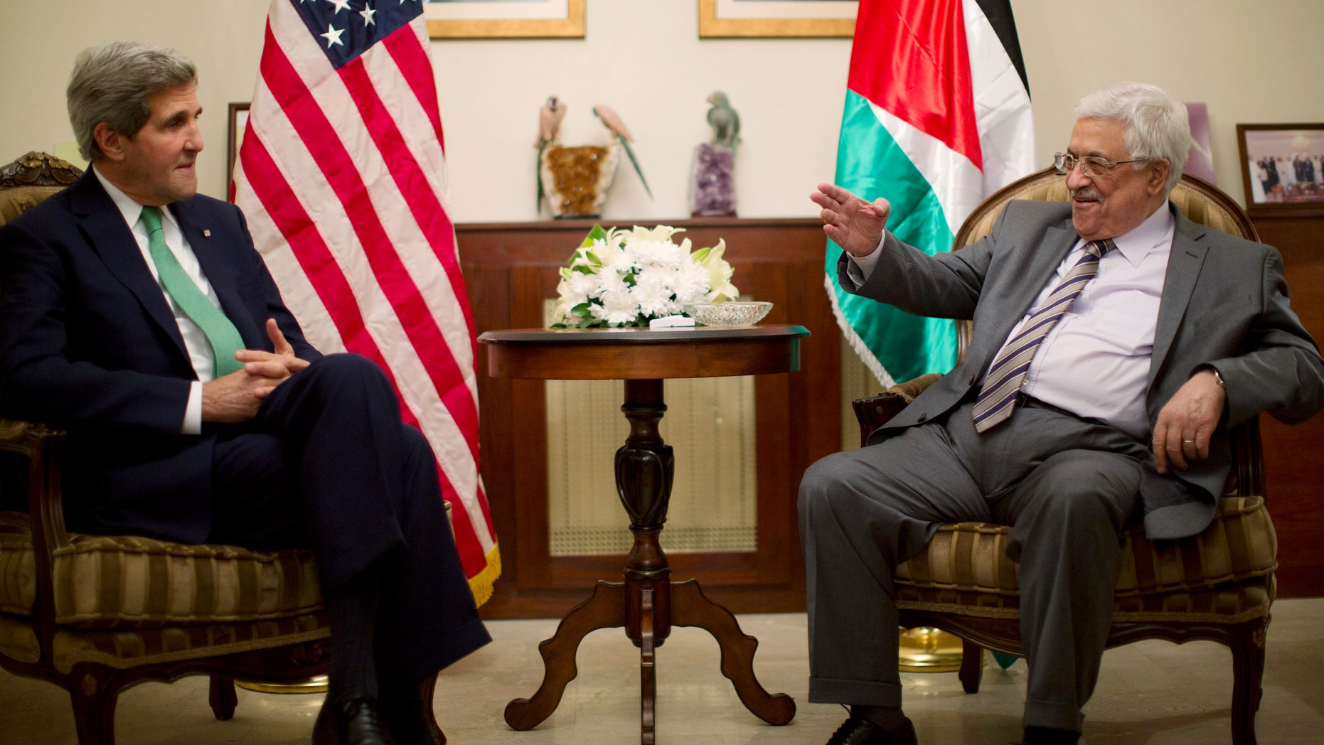 U.S. Secretary of State John Kerry, left, meets with Palestinian President President Mahmoud Abbas in Amman, Jordan, Thursday, Nov. 7, 2013. (AP Photo/Jason Reed, Pool)