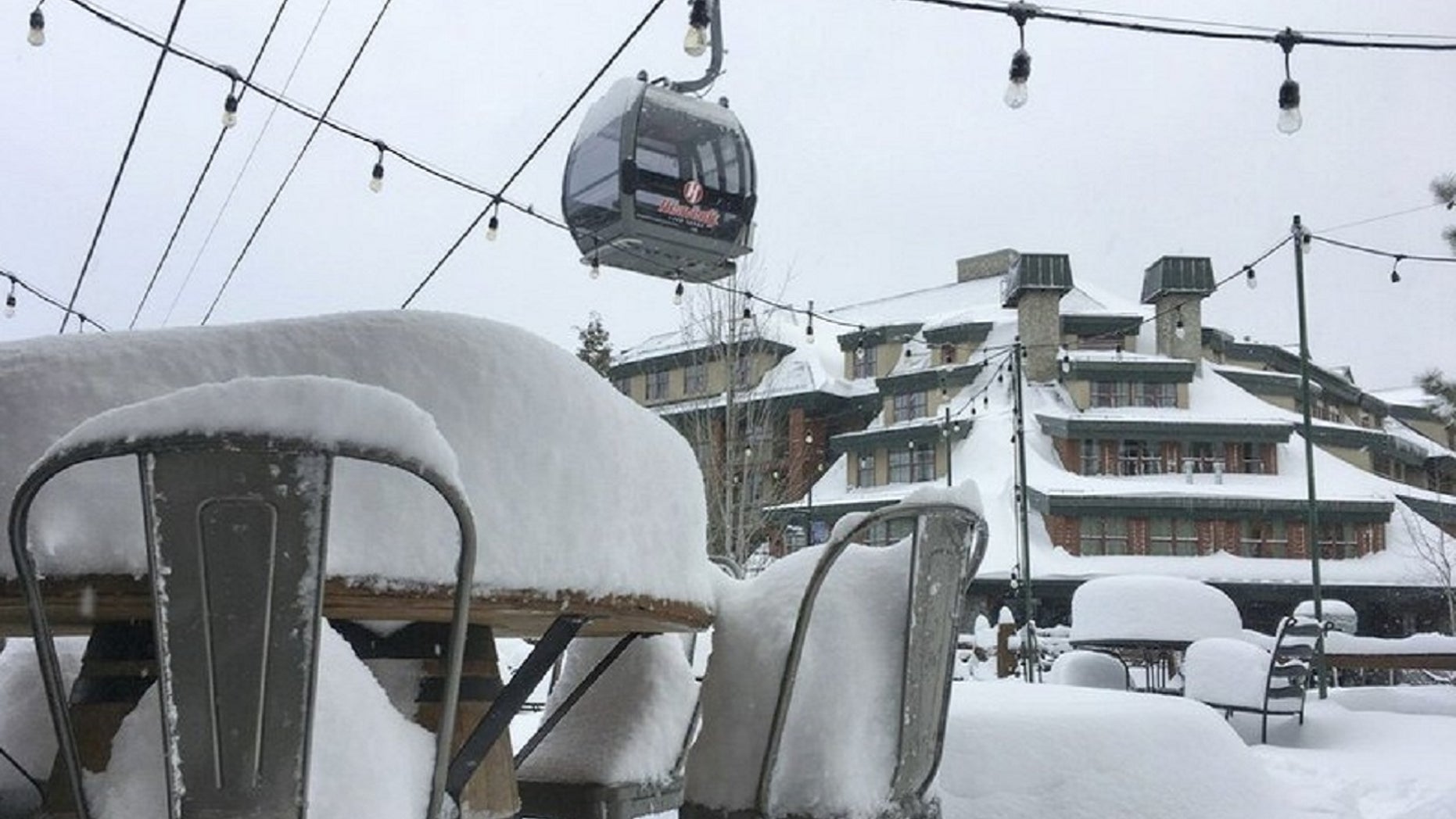 Fresh snow covers outdoor furniture in South Lake Tahoe, Calif., March 2, 2018.