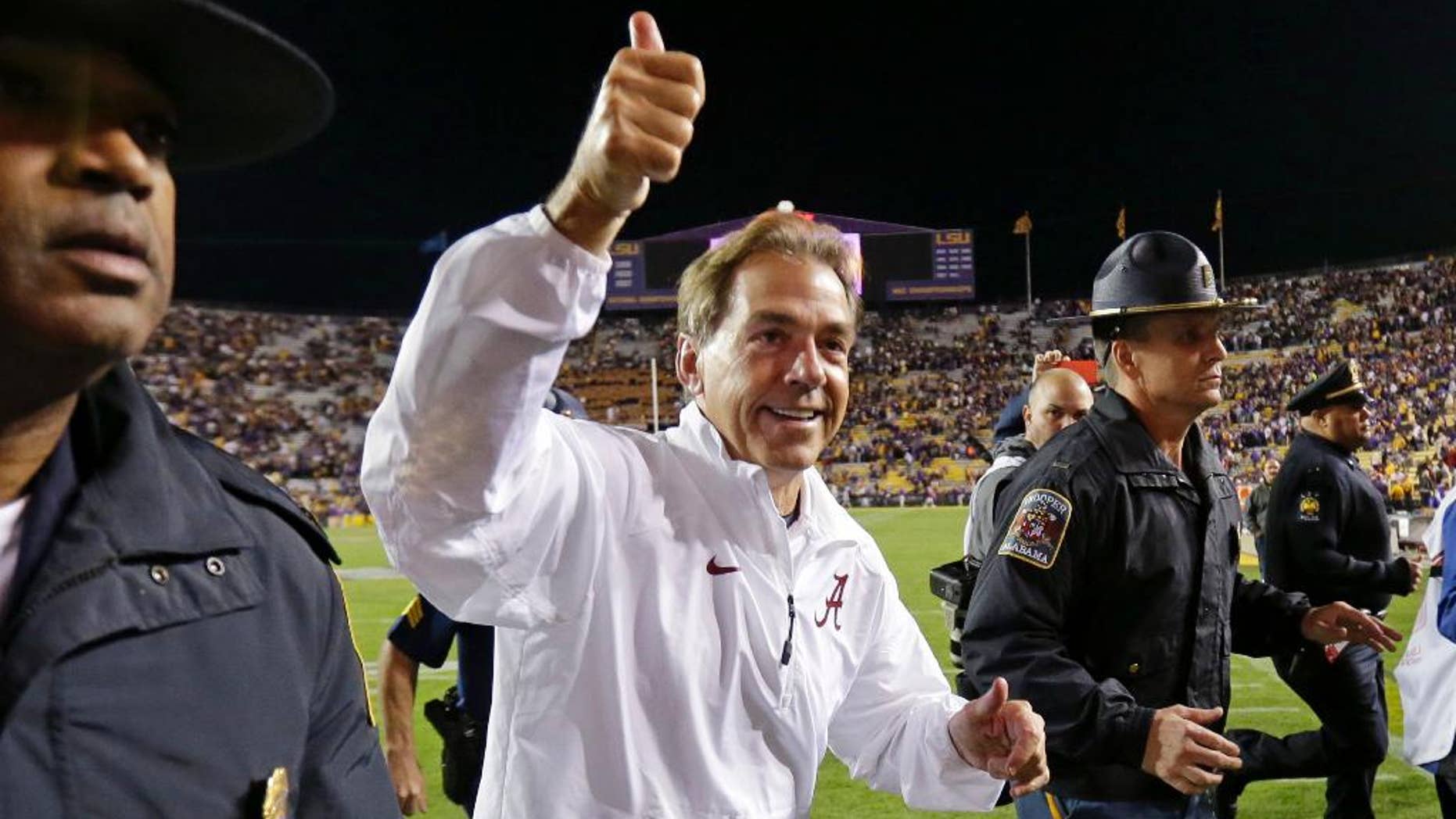 LSU head coach Les Miles yells at a referee in the second half of an NCAA college football game against Alabama in Baton Rouge, La., Saturday, Nov. 8, 2014. Alabama won in overtime 20-13. (AP Photo/Gerald Herbert)