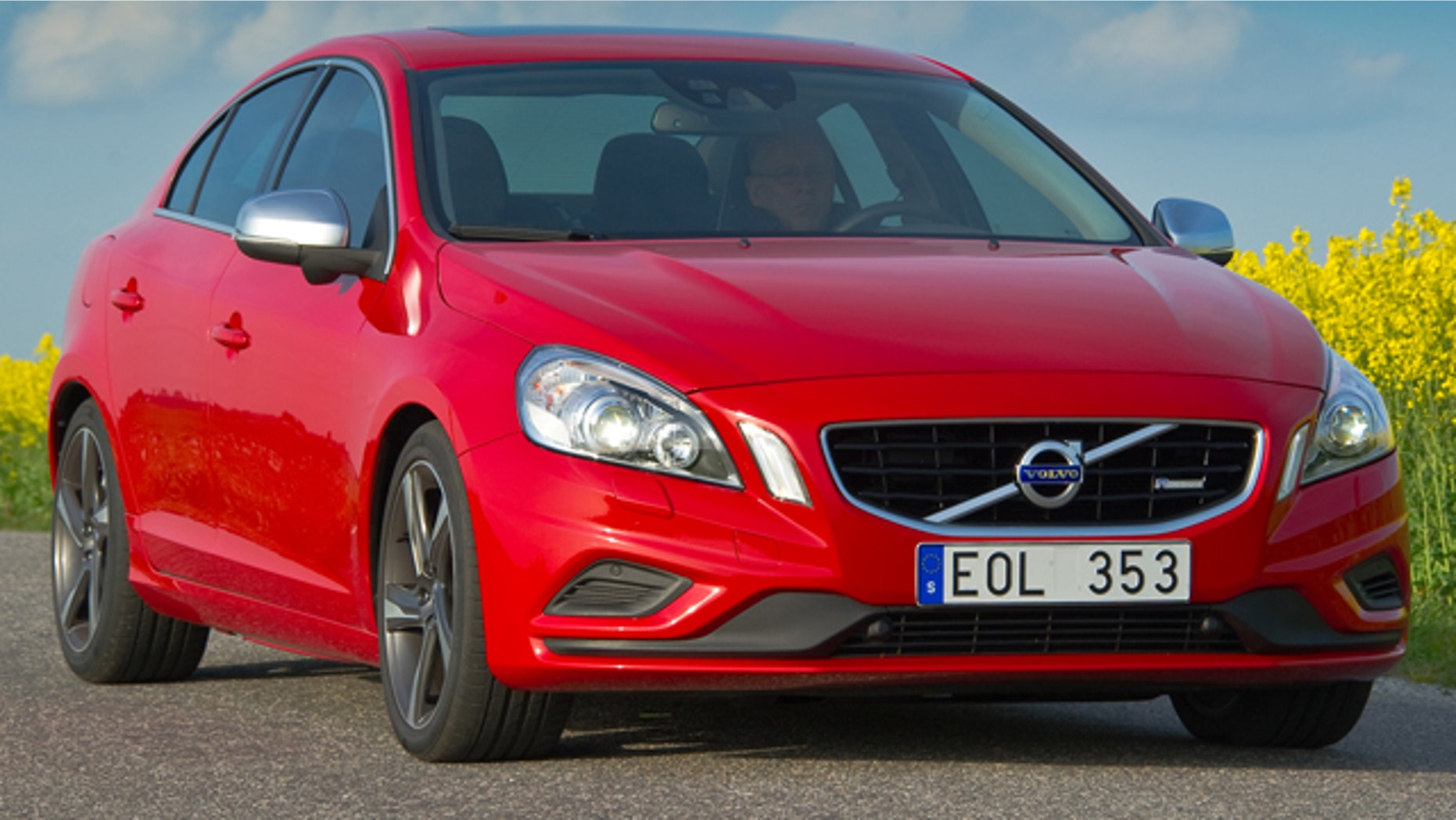 This is a stock photo of a Volvo S60 compact luxury sedan manufactured and marketed by Volvo, a Sweden-based company. It features a typical Swedish license plate.