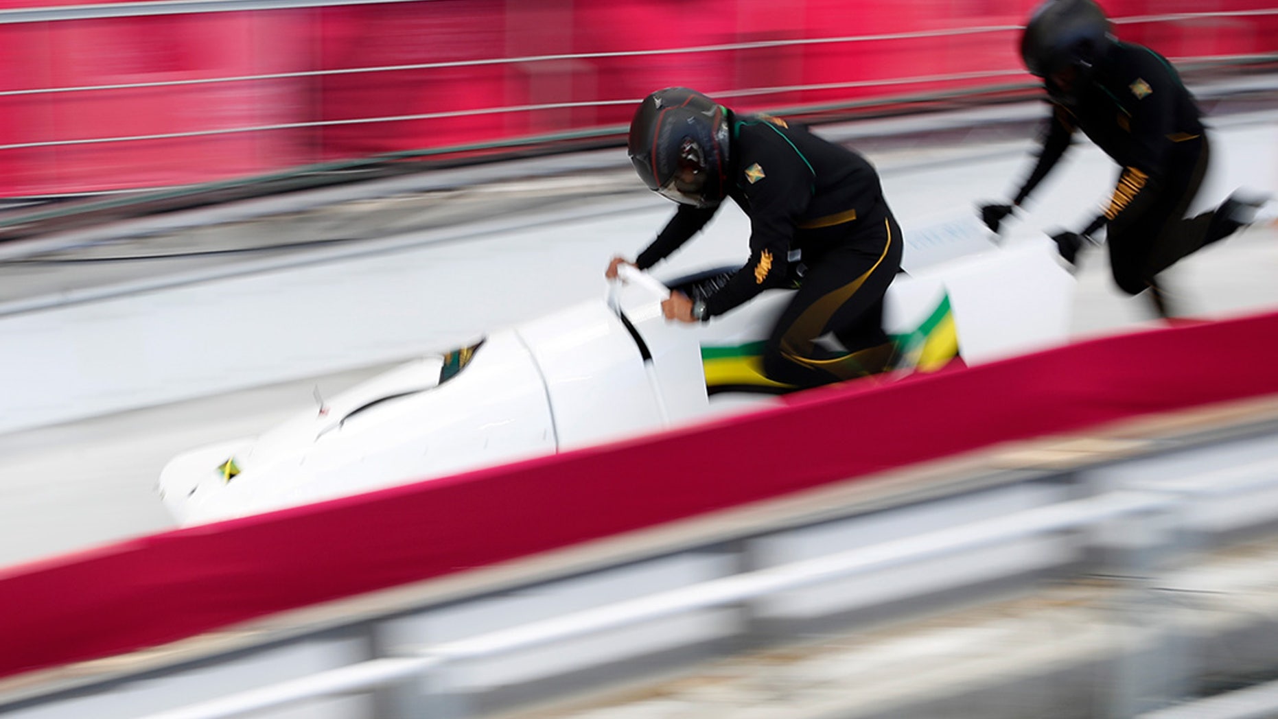 Jazmine Fenlator-Victorian and Carrie Russell of Jamaica in action at the 2018 Winter Games.