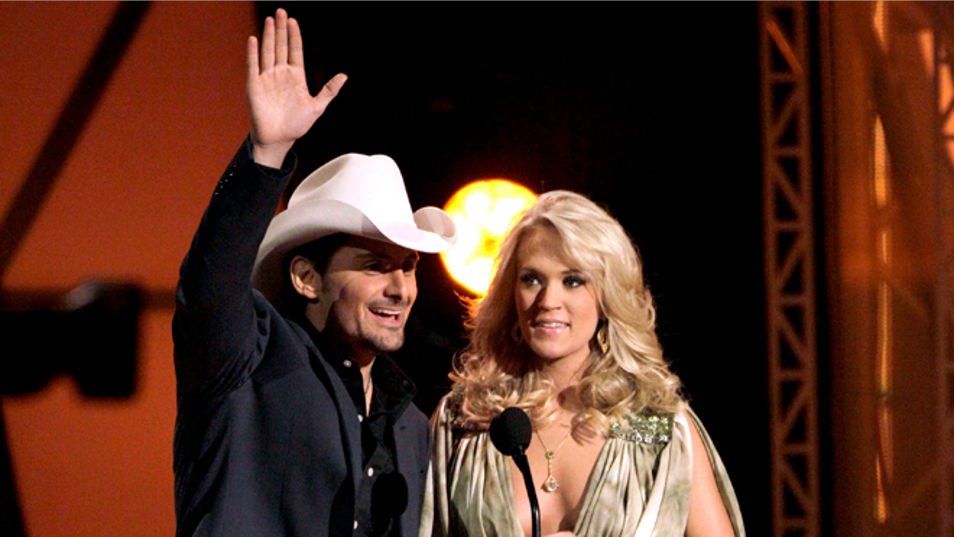 Nov. 9, 2011: This file photo shows hosts Brad Paisley, left, and Carrie Underwood speak during the 45th Annual CMA Awards in Nashville, Tenn.
