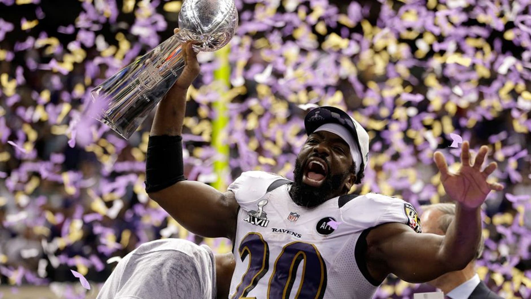 NEW ORLEANS, LA - FEBRUARY 03: Ed Reed #20 of the Baltimore Ravens celebrates with the VInce Lombardi trophy after the Ravens won 34-31 against the San Francisco 49ers during Super Bowl XLVII at the Mercedes-Benz Superdome on February 3, 2013 in New Orleans, Louisiana. (Photo by Ezra Shaw/Getty Images) *** Local Caption *** Ed Reed