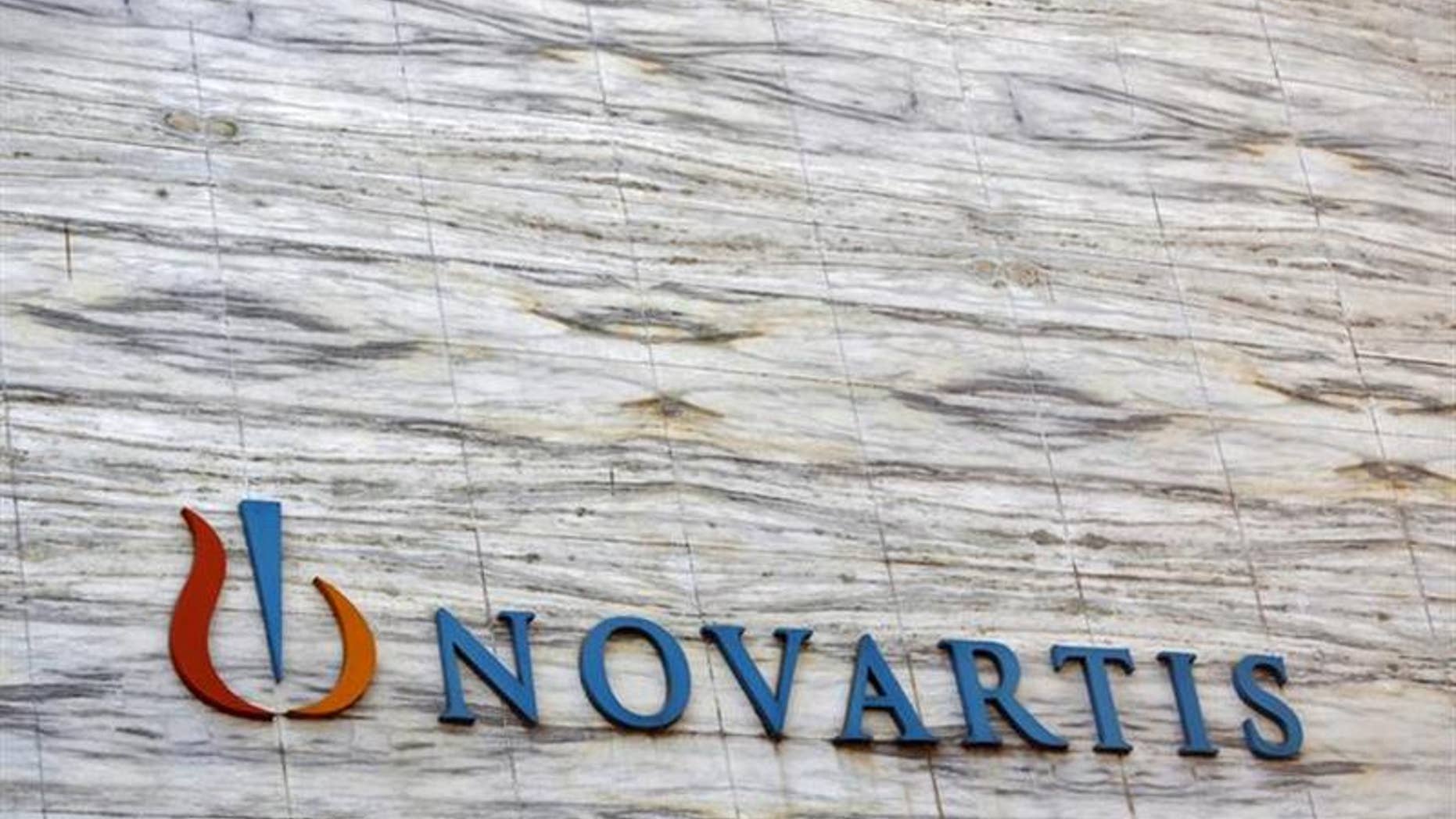 A Novartis logo is pictured on its headquarters building in Mumbai April 1, 2013. REUTERS/Vivek Prakash