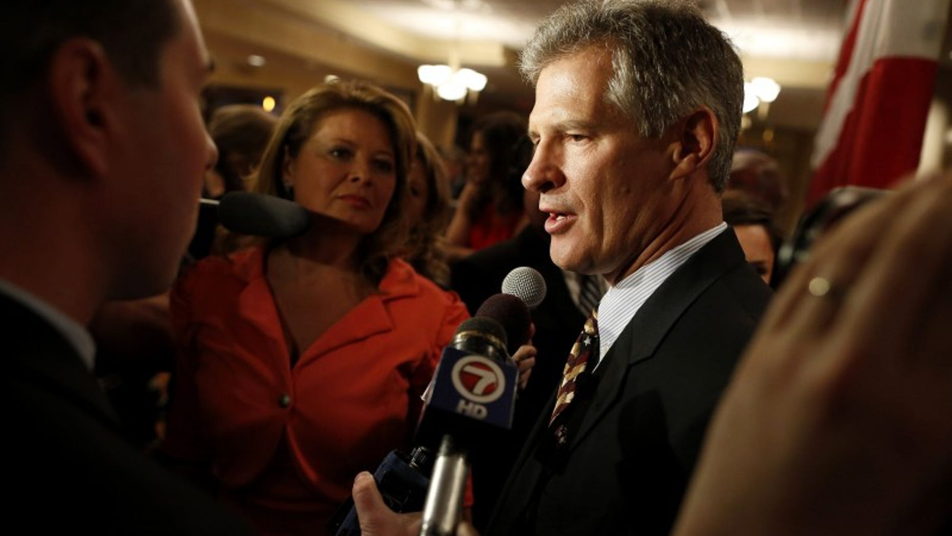Republican Scott Brown talks to the media after announcing his bid for the United States Senate primary election in Portsmouth, N.H., April 10, 2014. (REUTERS/Dominick Reuter)