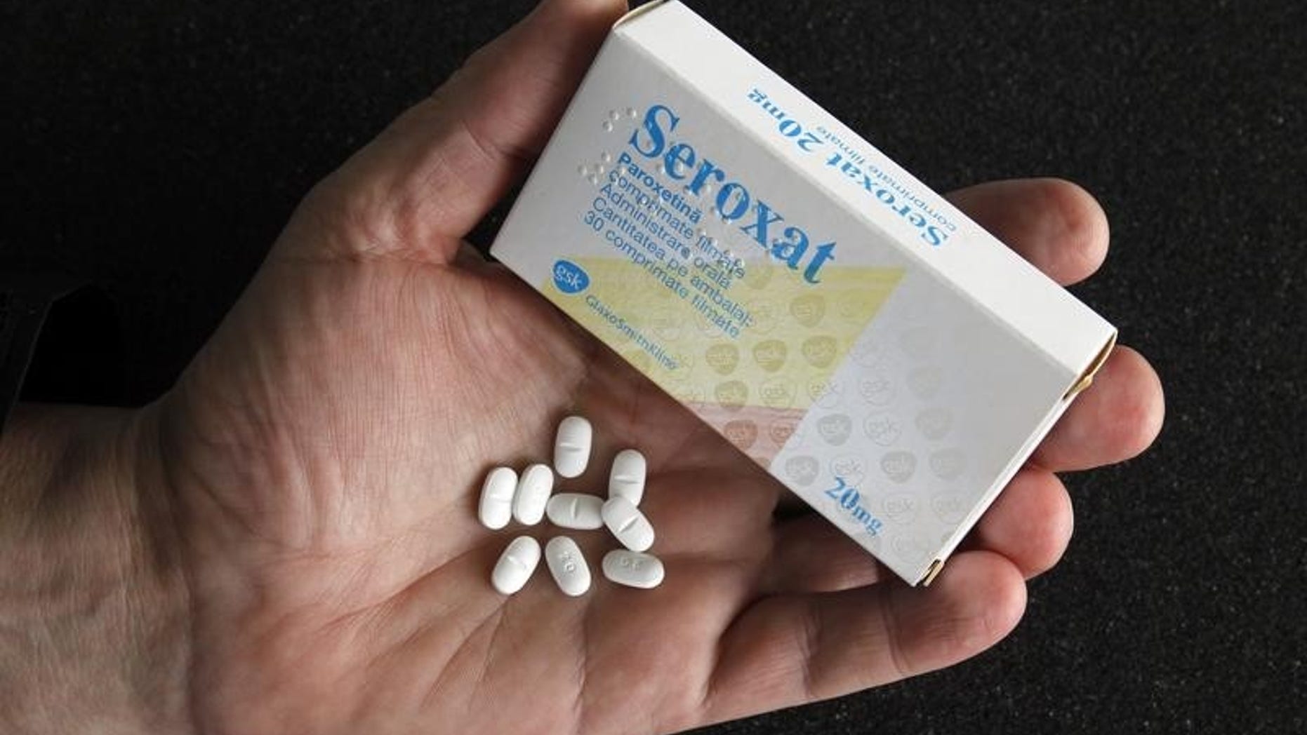 A Seroxat box and pills are seen in this illustration picture taken in Bucharest April 19, 2013. REUTERS/Bogdan Cristel
