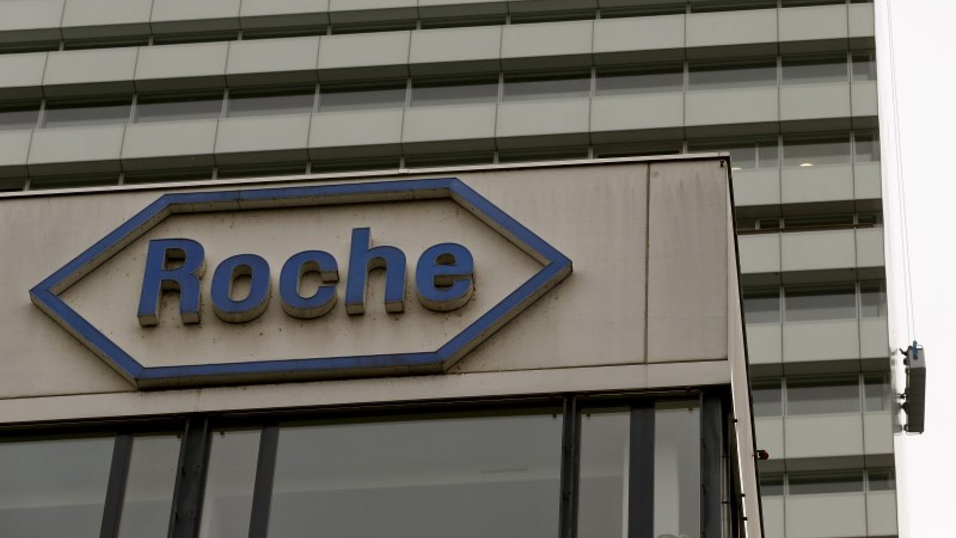 Swiss drugmaker Roche's logo is seen at their headquarters in Basel, Switzerland October 22, 2015. REUTERS/Arnd Wiegmann